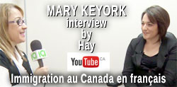 photo of Mary Keyork being interviewd by Hay Horizon, Tamar chahinian, in Montreal in 2014 - on Youtube - in French / en franç about what a immigration lawyer can do for applicants and appelas - click to Youtube